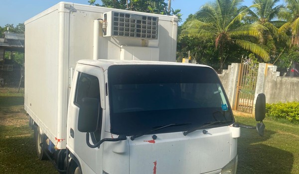 3 ton, 2010 Isuzu Elf with freezer