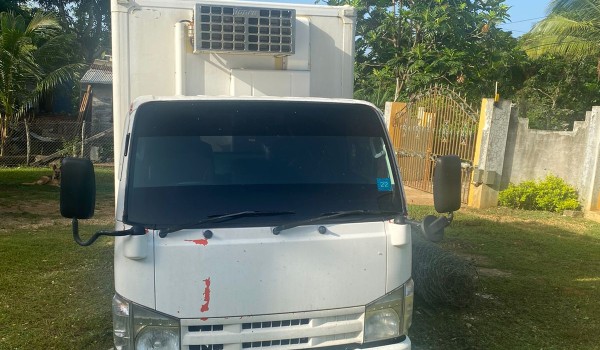 3 ton, 2010 Isuzu Elf with freezer